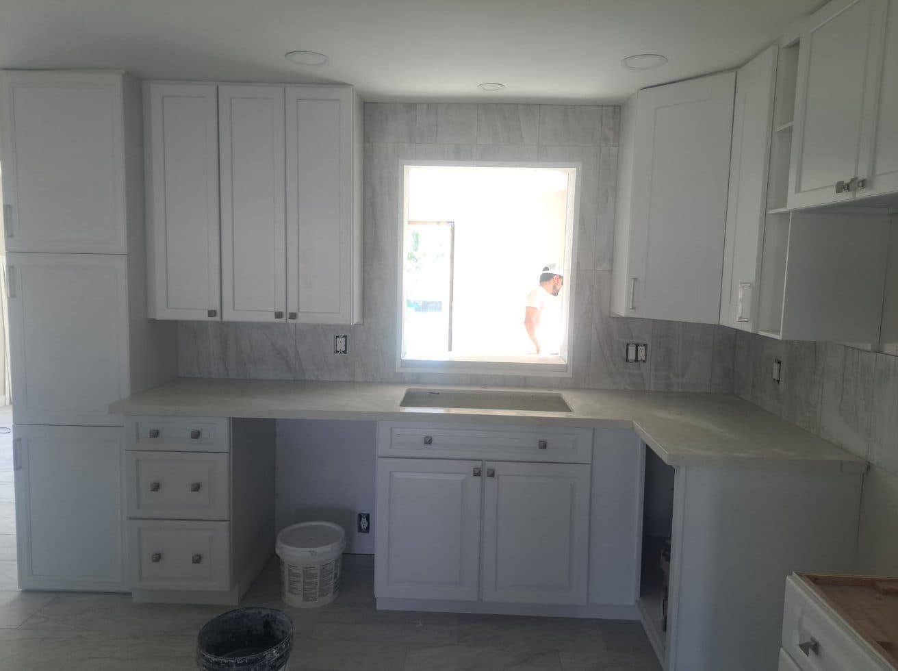 White shaker cabinets, installed